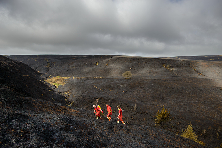 Firefighters work to tackle a large moorland fire near Buxton in the Peak District. Derbyshire, England. 3rd May 2025.